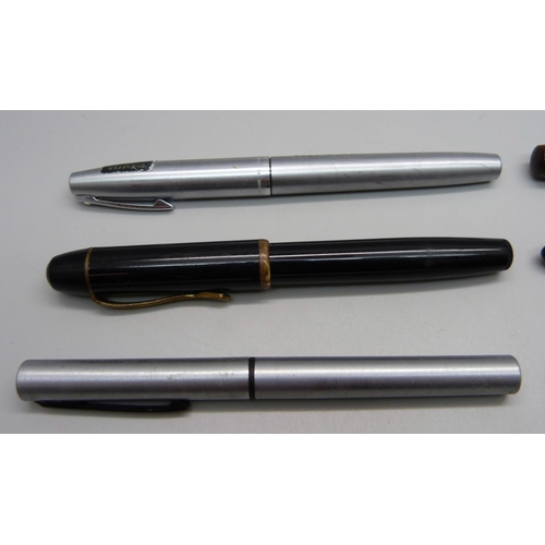 890 - A Waterman Skywriter pen with 14ct gold nib, lacking clip, four Sheaffer pens and a Tropen Scholar p... 