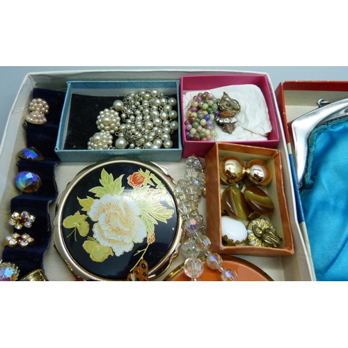 893 - A collection of vintage compacts, a scent bottle, clip-on earrings and a bag