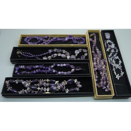 894 - Six amethyst necklaces, boxed