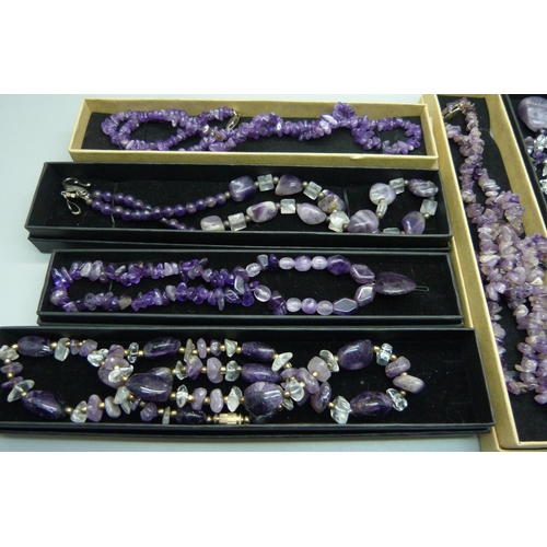 894 - Six amethyst necklaces, boxed