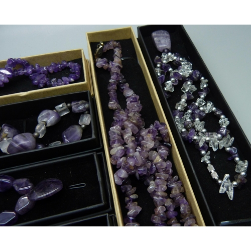 894 - Six amethyst necklaces, boxed