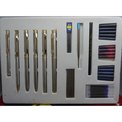 909 - A collection of pens, Parkers, Elysee, Stratton ballpoint and a pen set