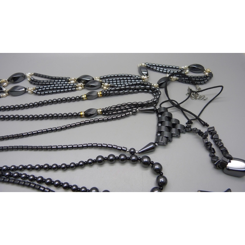 911 - Eight hematite necklaces