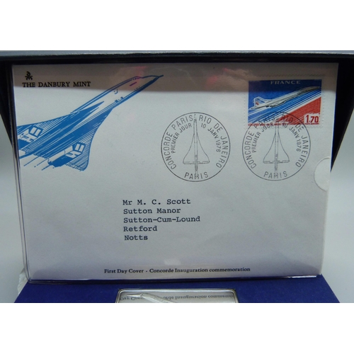 913 - A Concorde commemorative silver ingot, January 21st 1976 and first day cover, with certificate