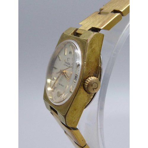 933 - A lady's Omega automatic date wristwatch