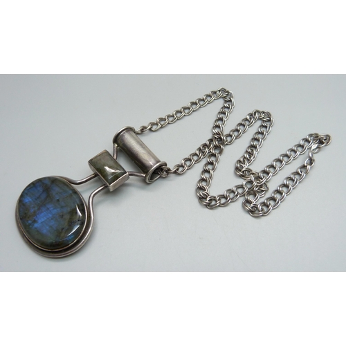 944 - An Arts and Crafts labradorite set pendant with 925 silver chain, pendant tests as silver, chain 43c... 