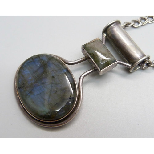 944 - An Arts and Crafts labradorite set pendant with 925 silver chain, pendant tests as silver, chain 43c... 