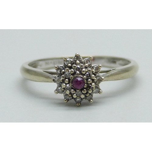 958 - A 9ct gold, ruby and diamond cluster ring, 1.7g, P