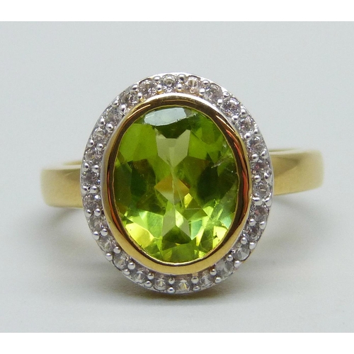 961 - A 925 silver gilt, peridot and zircon ring, M/N