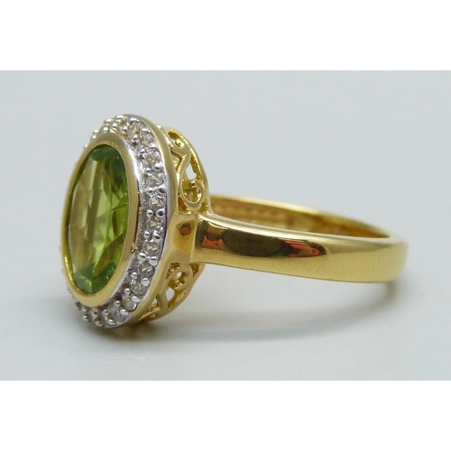 961 - A 925 silver gilt, peridot and zircon ring, M/N