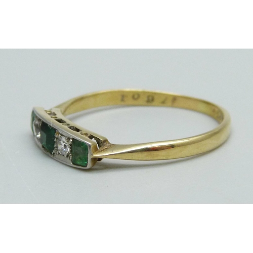 965 - An 18ct gold and five stone Art Deco ring, set with two diamonds, two emeralds and a replacement gre... 