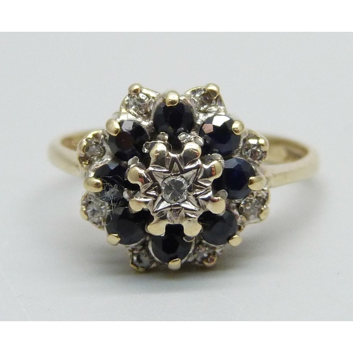 968 - A 9ct gold, sapphire and diamond cluster ring, 3.2g, M