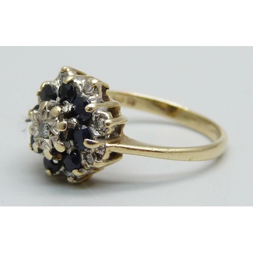 968 - A 9ct gold, sapphire and diamond cluster ring, 3.2g, M