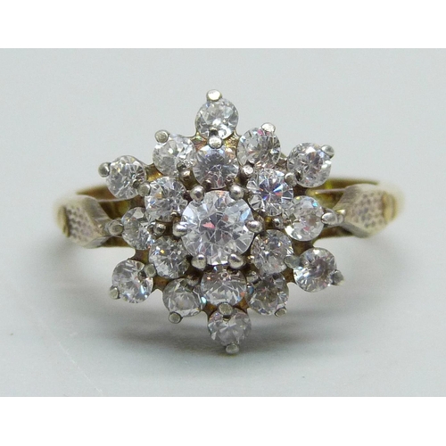 969 - A silver gilt cluster ring, N