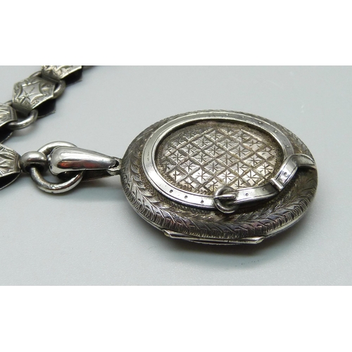 978 - A Victorian white metal locket and collar, locket 31mm wide