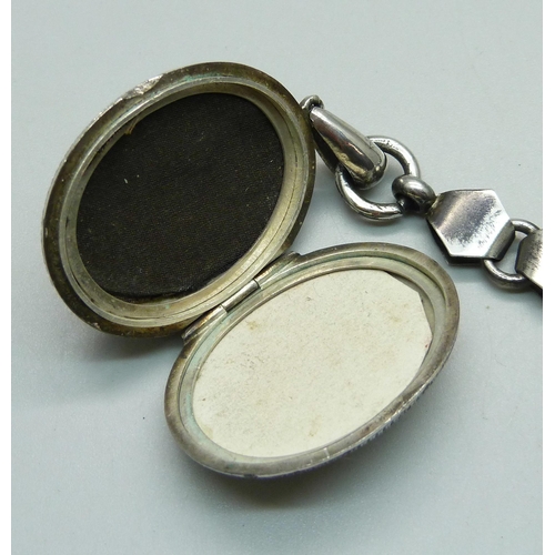 978 - A Victorian white metal locket and collar, locket 31mm wide