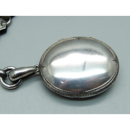 978 - A Victorian white metal locket and collar, locket 31mm wide