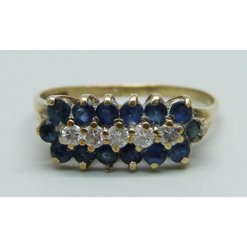 983 - A 9ct gold, three row sapphire and diamond cluster ring, 1.9g, P/Q