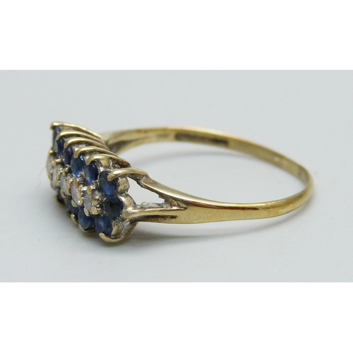 983 - A 9ct gold, three row sapphire and diamond cluster ring, 1.9g, P/Q