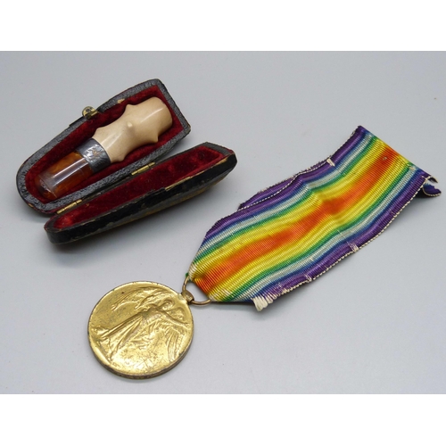 997 - A WWI Victory medal to 5282 Pte. E. Reid Y. & L. R.,  and a cased cheroot holder