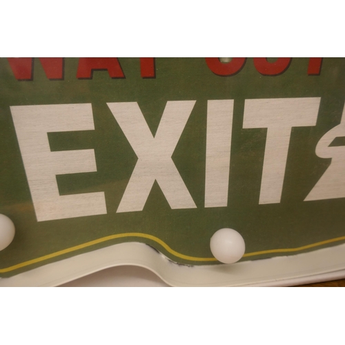 1403 - An illuminated exit sign