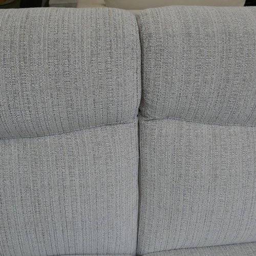 1498 - A grey weave three seater sofa, large two seater sofa, and armchair