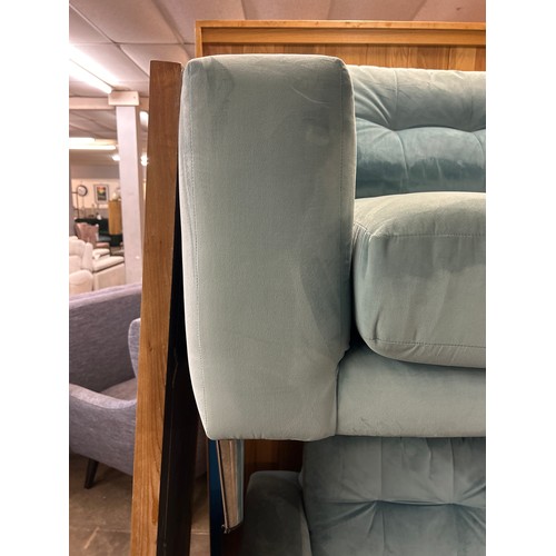 1612 - A pale blue velvet three seater sofa and two seater sofa(sun damaged)