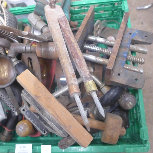 2001 - A large quantity of woodworking tools including planes, a vice, ratchet strap, etc.