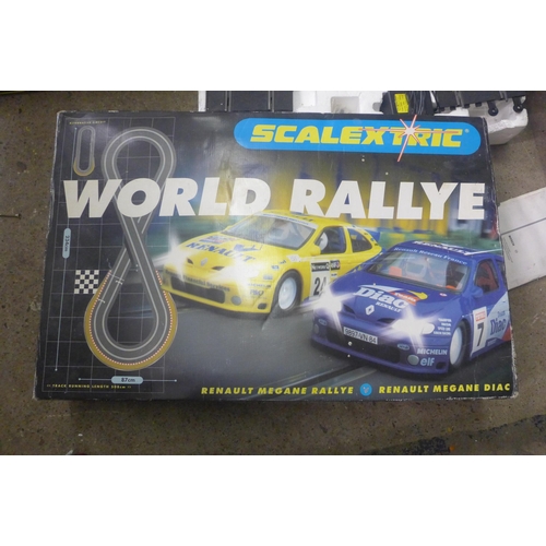 2061 - 4 Boxes of various Scalextric sets including World Ralley, Carterham Cup, ect and 1 Duke's of Hazard... 