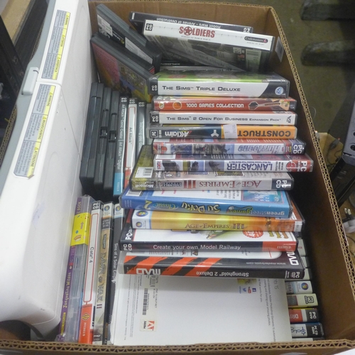 2073 - A box of approx. 70 PC games and 2 Wii consoles and accessory's