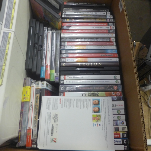 2073 - A box of approx. 70 PC games and 2 Wii consoles and accessory's