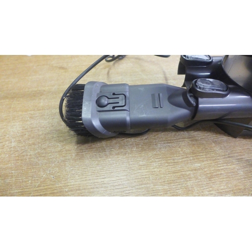 2075 - A Dyson  multi floor hand held vacuum cleaner (DC35) with mount and charger