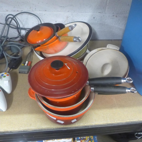 2090 - A quantity of pots and pan, various sizes and styles including Le Creuset