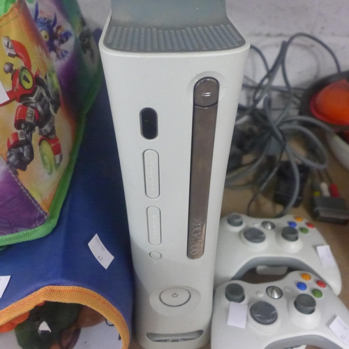 2091 - An Xbox 360 with an assortment of Skylanders, Disney Infinity figures and two controllers