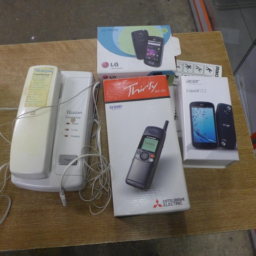 2105 - Two Nokia phones, a Samsung flip phone and other phones