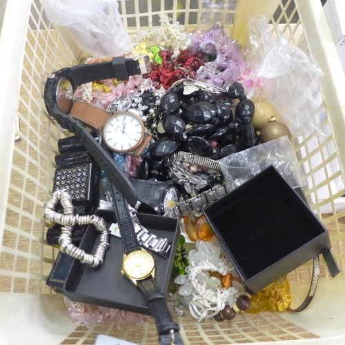 2111 - A basket of costume jewellery and wristwatches