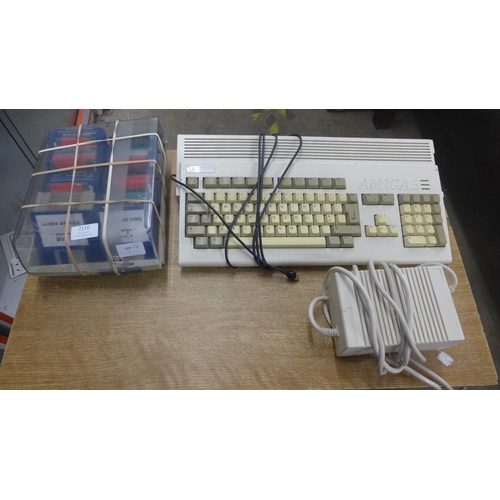 2116 - An Amiga Commodore A1200 with set up instructions, boxed and a collection of discs