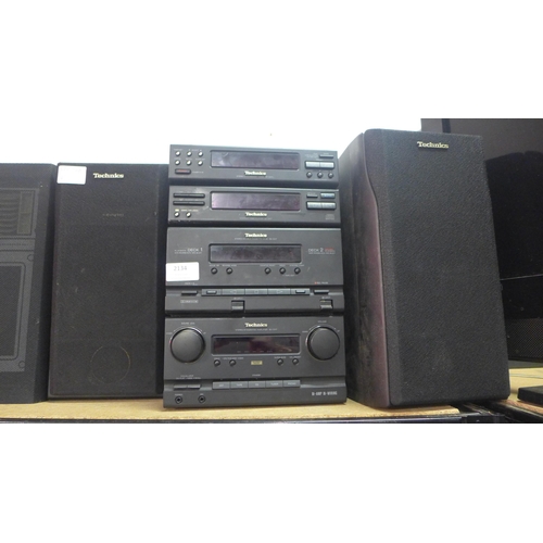 2134 - A Technics stereo hi-fi system including an ST-CH7L stereo synthesizer tuner, an SL-CH7 compact disc... 