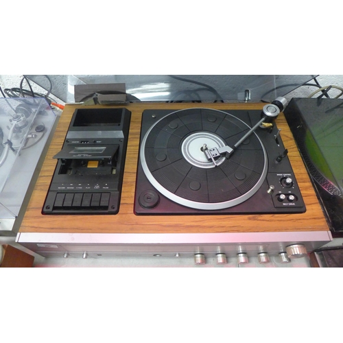 2189 - A Pye vintage stereo music system with tuner, stereo cassette recorder and belt driven turntable rec... 