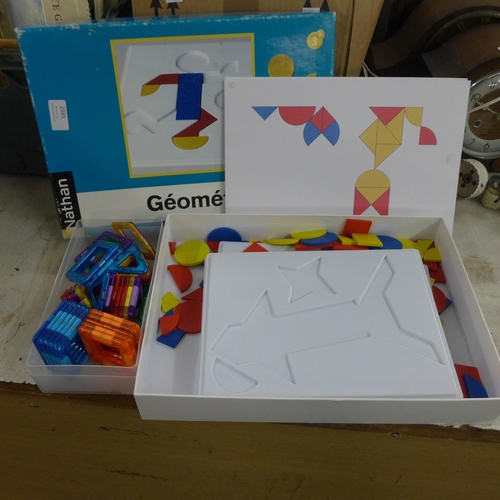 2385 - A Geometrix shape making game with plastic and wooden pieces and a set of magnetic tiles for buildin... 