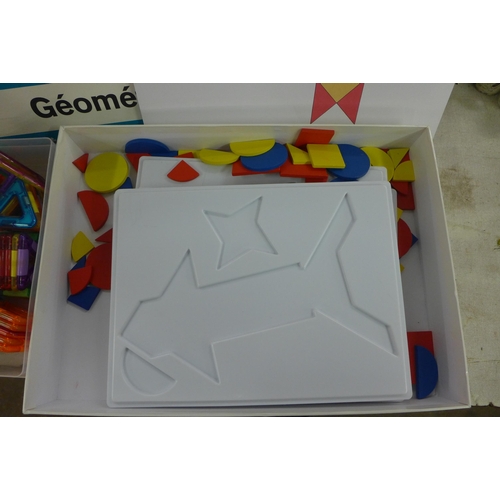 2385 - A Geometrix shape making game with plastic and wooden pieces and a set of magnetic tiles for buildin... 