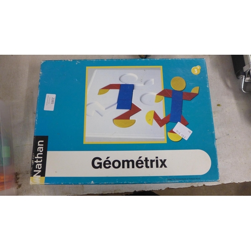 2385 - A Geometrix shape making game with plastic and wooden pieces and a set of magnetic tiles for buildin... 