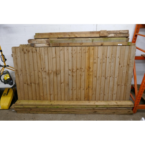 2258 - A quantity of seven 10ft x 5.5ft feather edge fence panels, seven 8ft x 4'' x 3'' wooden fence posts... 