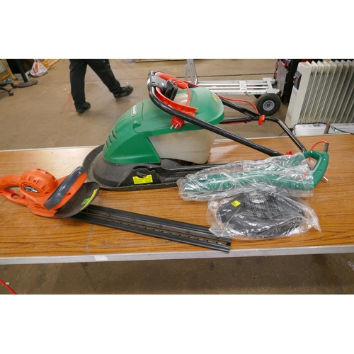 2307 - A quantity of gardening tools including a Sovereign electric hedge trimmer (model n o. HTEG33-550), ... 