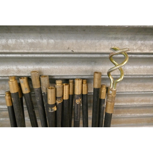 2309 - A set of plastic and brass drain rods (16 rods and 3 heads)