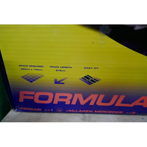 2312 - A Scalextric formula one X3 (Ferrari/McLaren) set in box