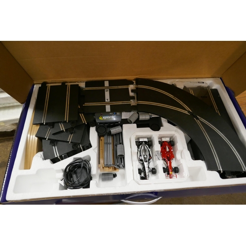 2312 - A Scalextric formula one X3 (Ferrari/McLaren) set in box