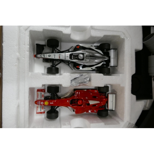 2312 - A Scalextric formula one X3 (Ferrari/McLaren) set in box