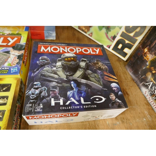 2323 - A collection of board games including four Monopoly