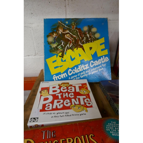 2323 - A collection of board games including four Monopoly